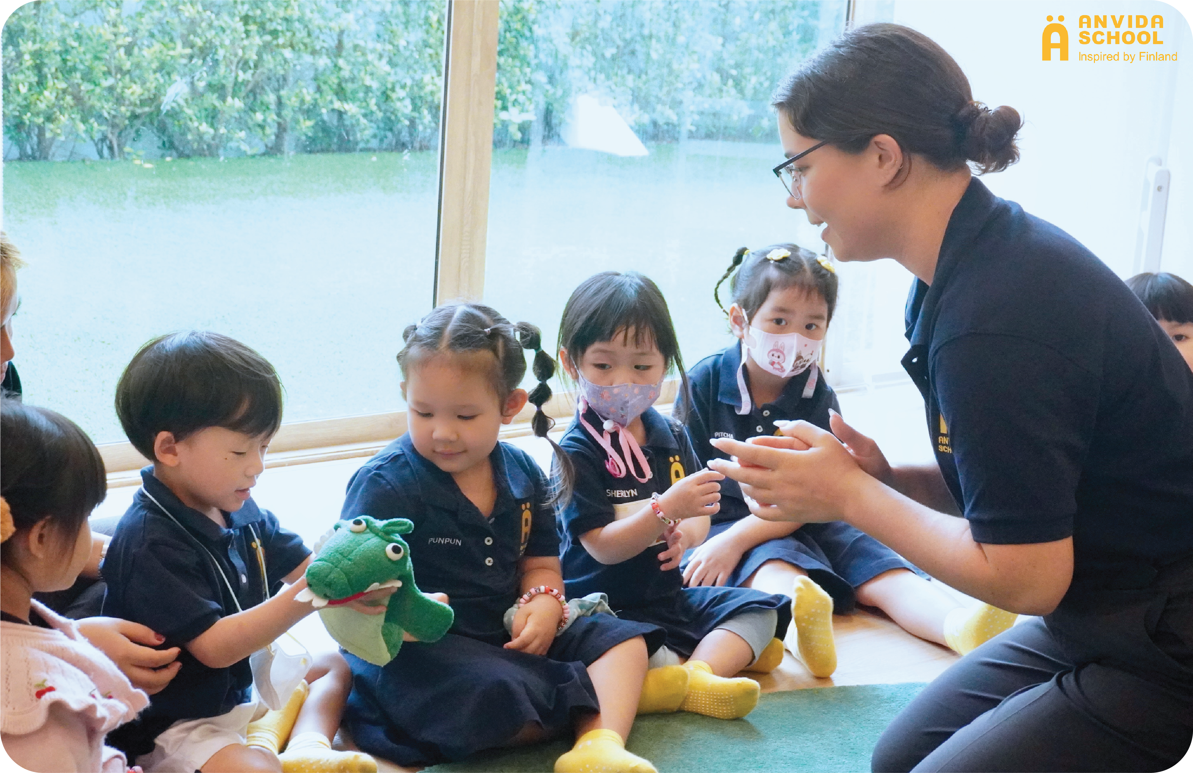 Teacher interacting with students